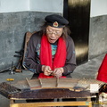 Man playing his gǔzhēng
