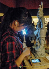 Young Sculptor Working on a Statue